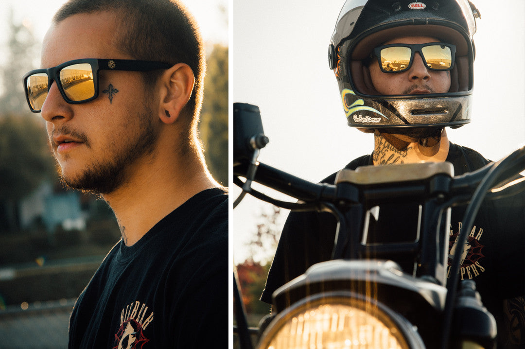 Roger Regan wearing Heat Wave Visual Vise Sunglasses black frame with gold lenses.