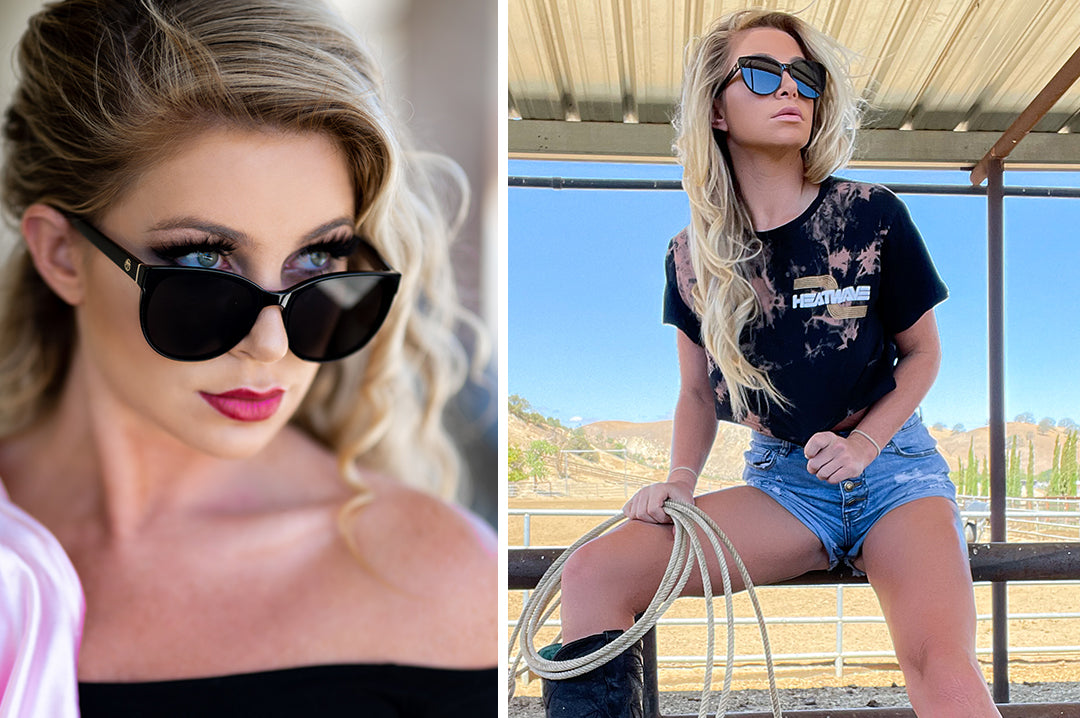 Country girl wearing the Heat Wave Visual Womens Carat Sunglasses with black frame and black lenses.