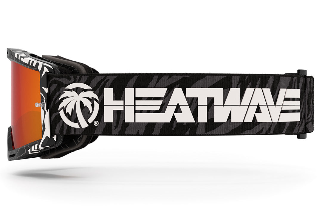 Side view of the Heat Wave Visual MXG 250 Motorsport Goggles in the Patrick Evans zebra stirpe color with firestorm red lens.