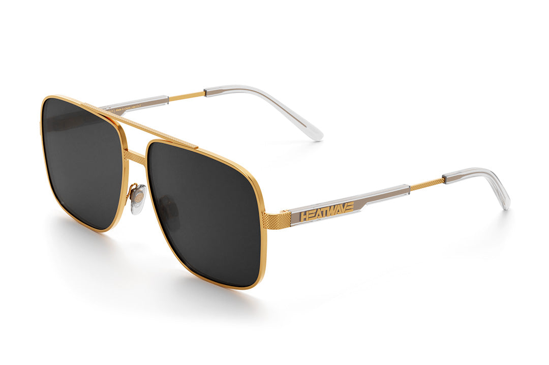 Heat Wave Visual Nimitz Sunglasses with gold frame and black lenses.