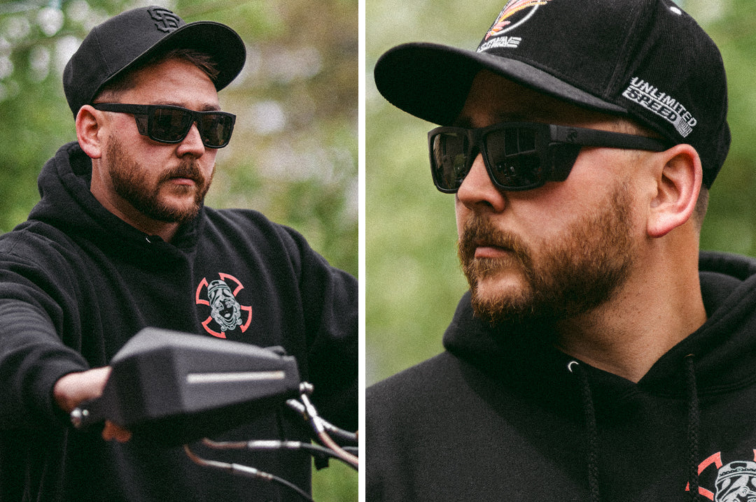 Biker wearing the Heat Wave Visual Performance Vise with black frame, black lenses and black side shields.