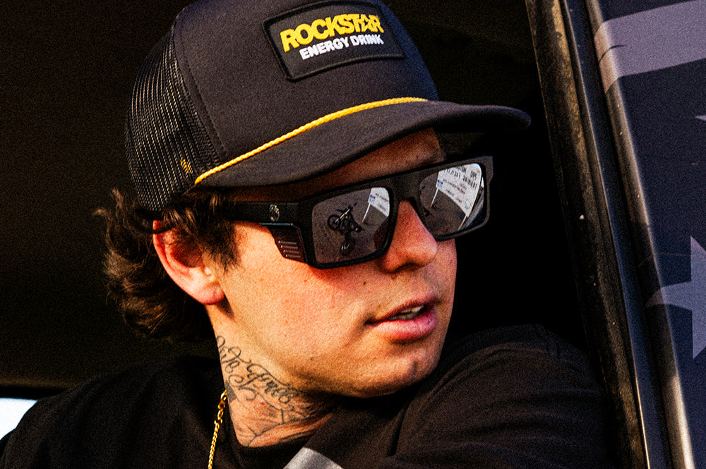 Colby Raha rocking the Heat Wave Visual Performance Rayth Silver Sunglasses.