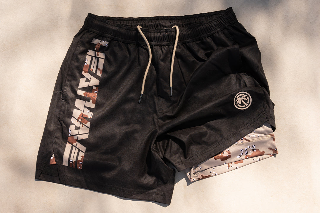 Close up of the black Heat Wave desert storm performance shorts with spandex liner.