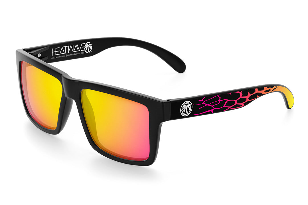 Heat Wave Visual Vise Sunglasses with black frame, core print arms and tropic pink yellow lenses.
