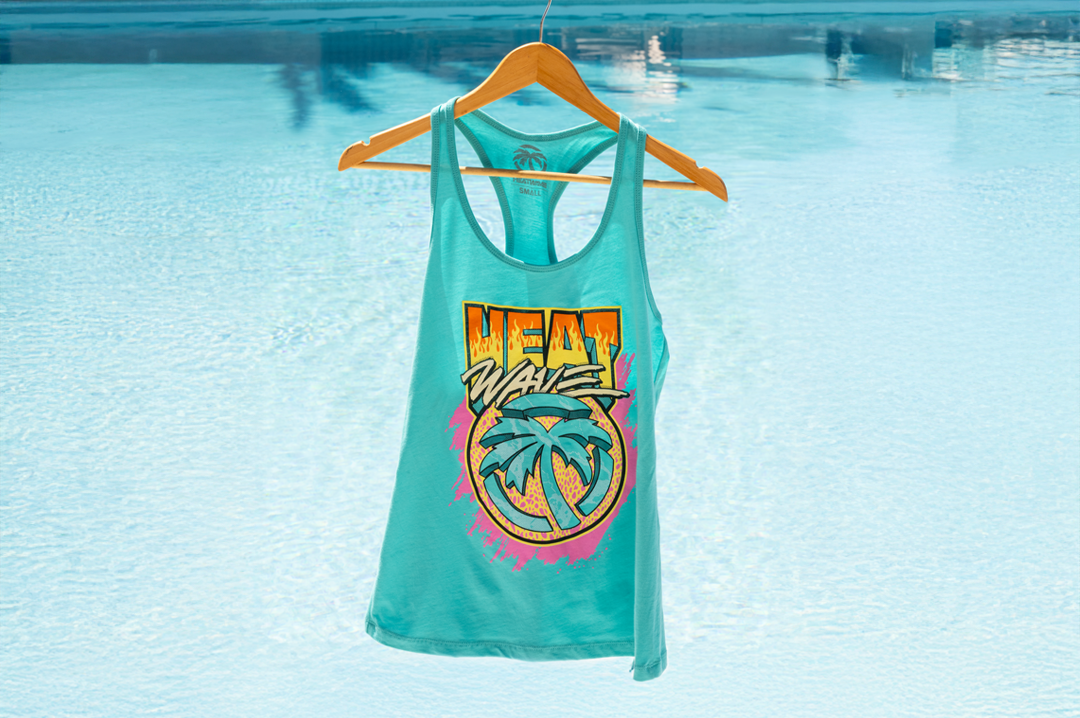 Heat Wave Visual Intense Ladies Tank Top with a pool in the background. 